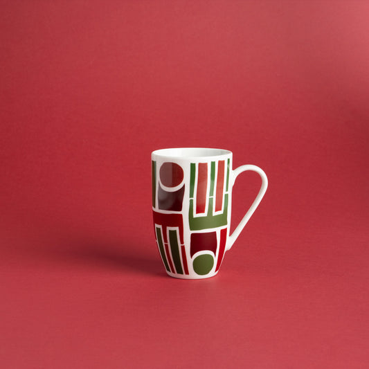 Porcelain mug with abstract geometric shapes in a bold color palette.