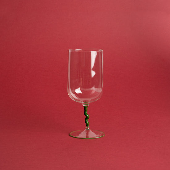 Handmade wine glass with green spiral stem
