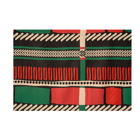 Linen Placemat in a green stamps pattern