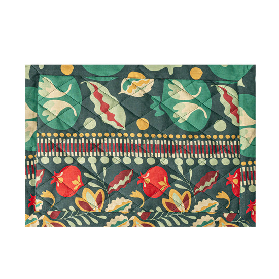 Linen Quilted Placemat in a green pomegranates pattern