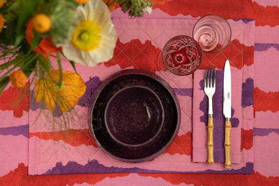 Linen Quilted Placemat in a pink tie-dye pattern