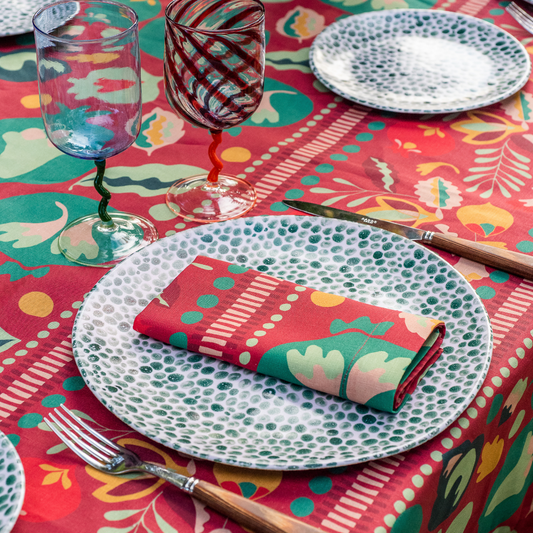 Linen Placemat in a terracotta pomegranates pattern