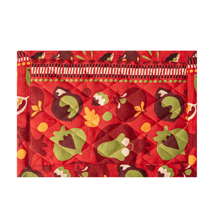 Linen Quilted Placemat in a red pomegranates pattern