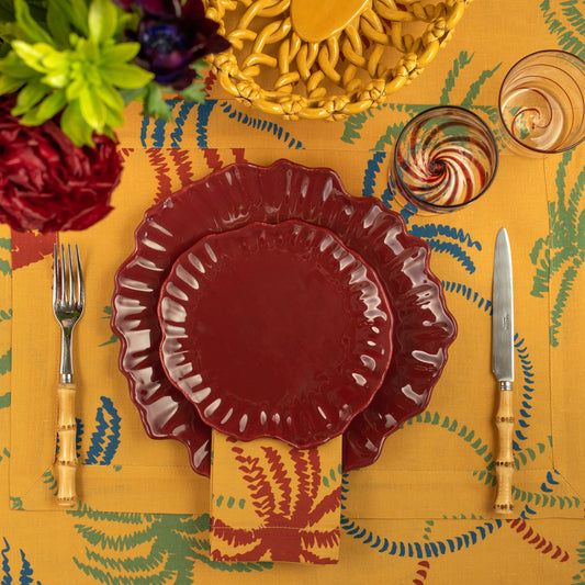 Linen Placemat in a mustard yellow palm trees pattern