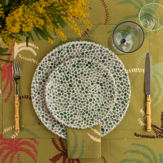 Linen Placemat in an olive green palm trees pattern