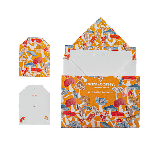 Correspondence box including 10 cards, 10 envelopes and 10 gift tags in an orange mushrooms pattern.